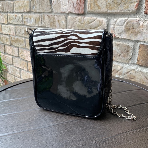 Zebra and black crossbody with silver chain strap. New condition. - Picture 3 of 6